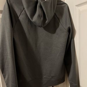 Womens Under Armour zip up hoodie  size medium  grey.